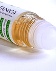 Close-up of Botanica Extreme Relief CBD body oil roll-on applicator showing glass bottle and smooth roller ball
