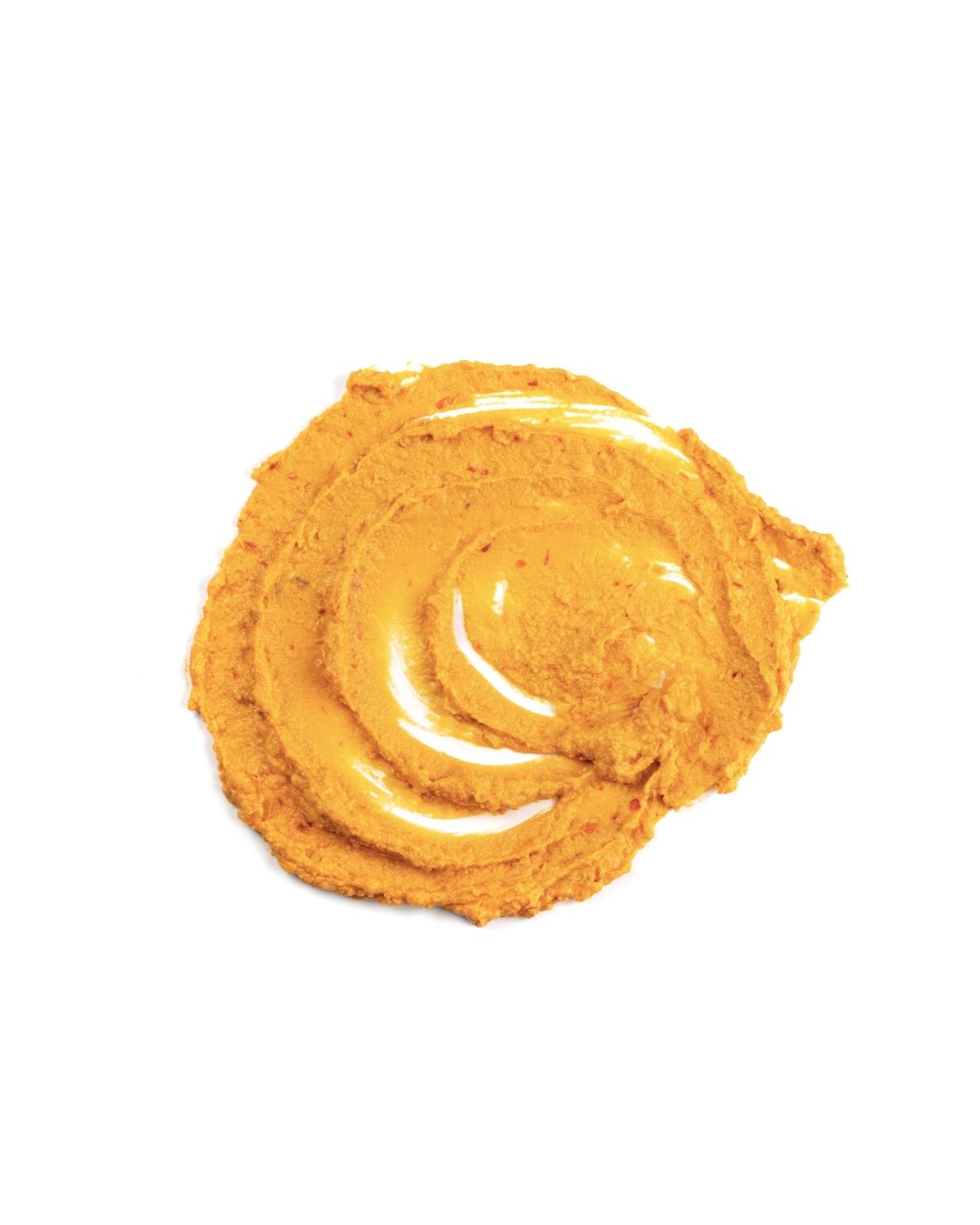 Smooth pumpkin puree swatch with glossy texture isolated on a white background